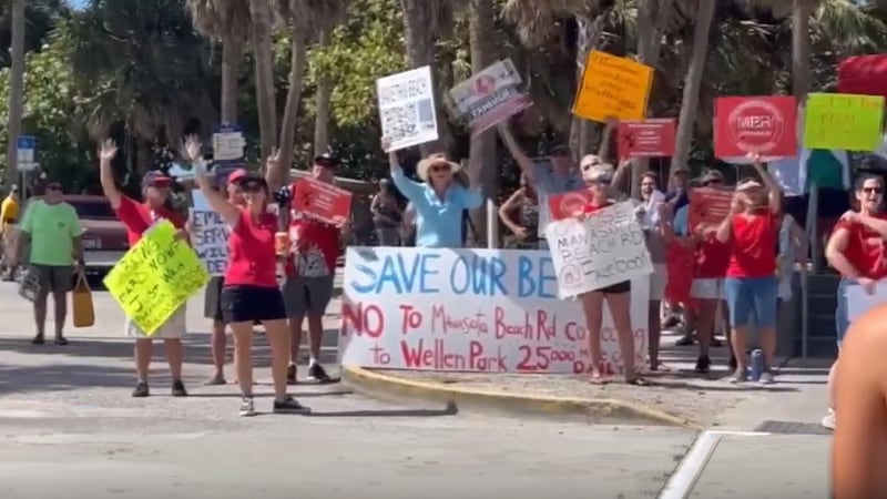 Neighbors opposed to a proposed Manasota Beach Road extension rallied Friday morning, saying...