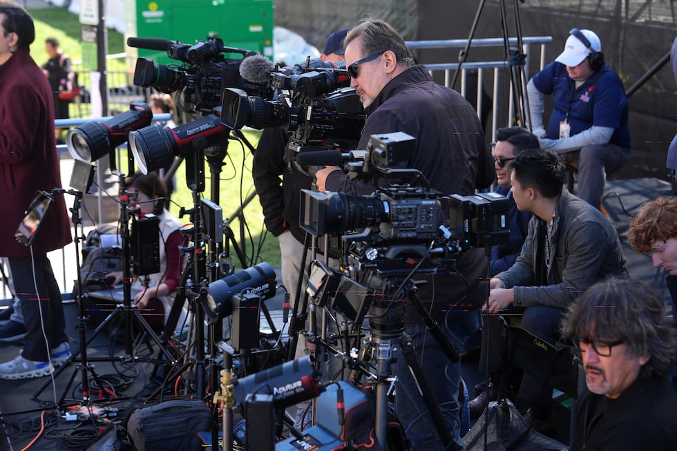 Television networks set up before President Donald Trump, first lady Melania Trump, China's...