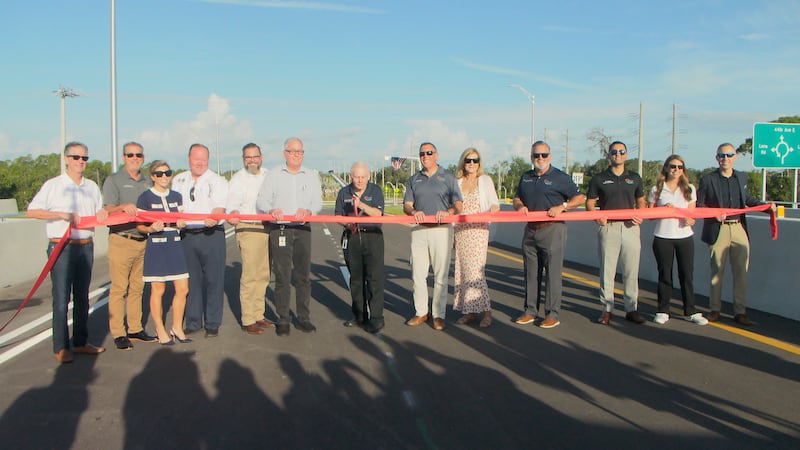 Manatee County commissioners, FDOT, and local leaders cut the ribbon for the end of the final...